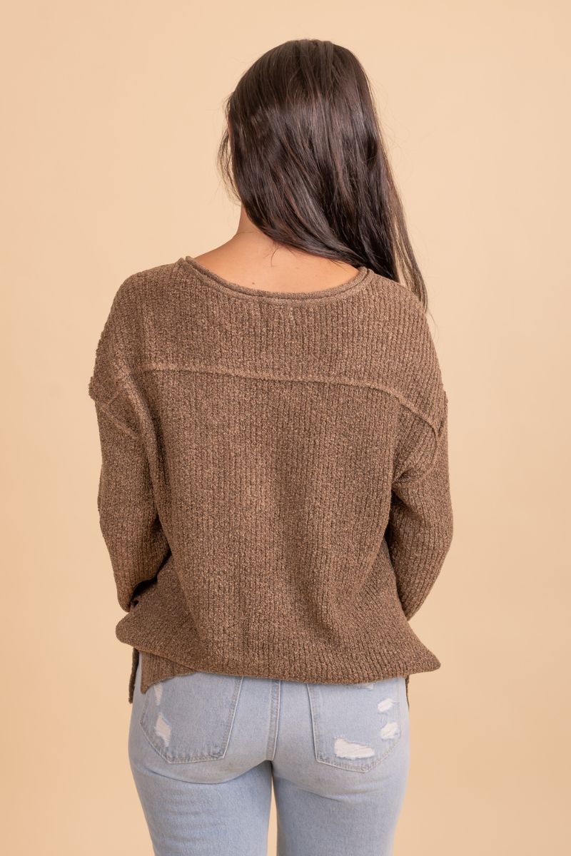 brown long sleeve partly button up sweater