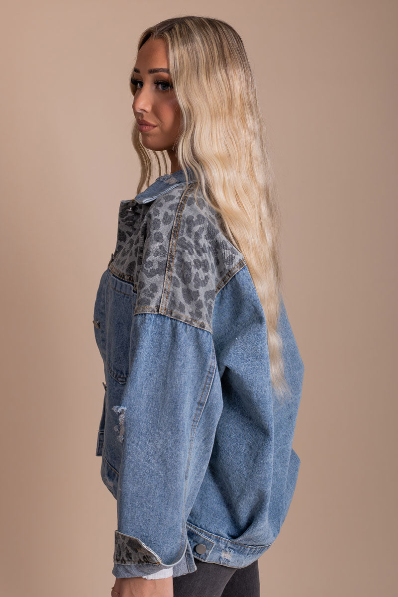 boutique women's denim blue jacket with animal print details