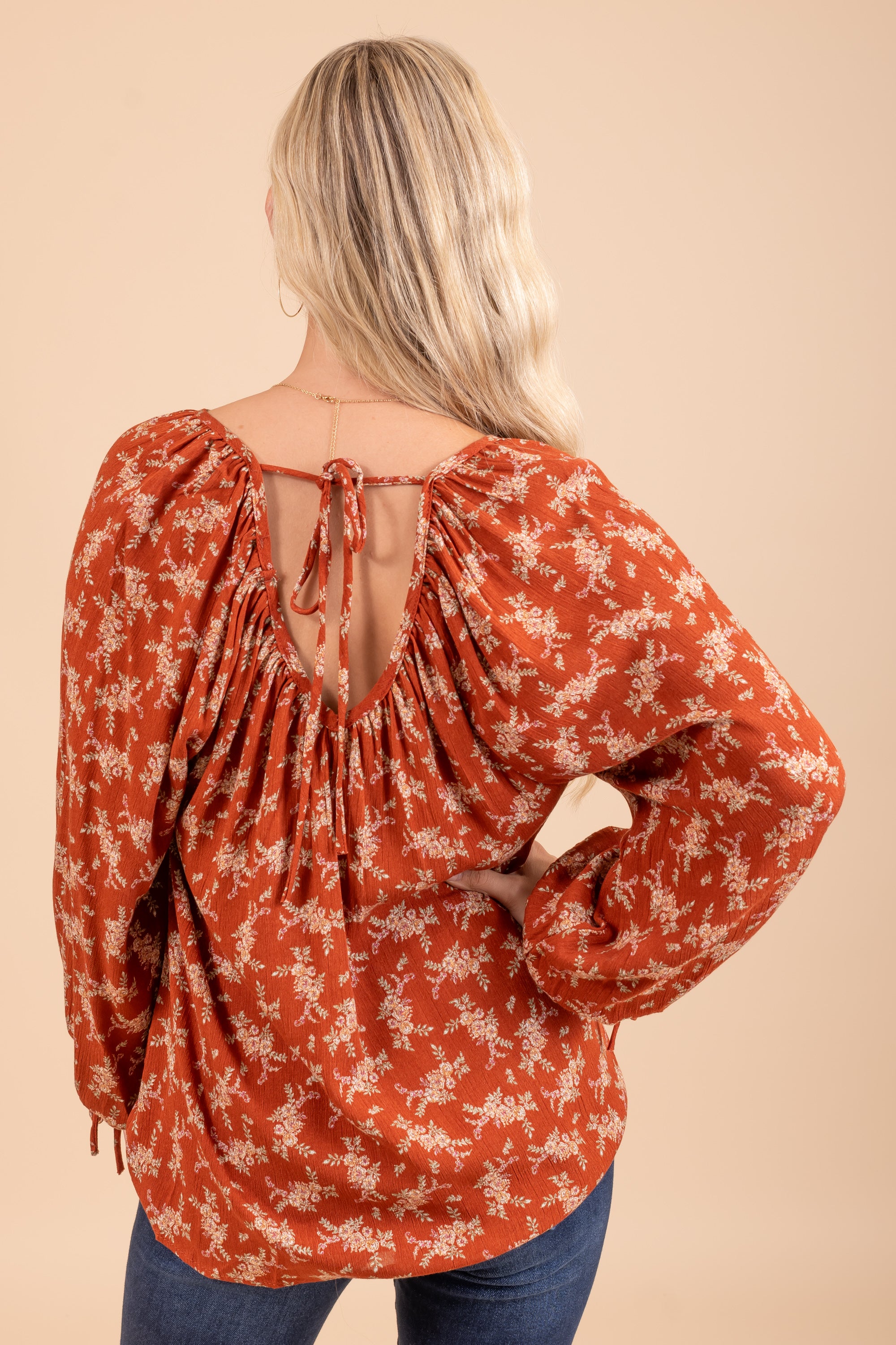 Floral v-neck rayon top with tied end long-sleeves