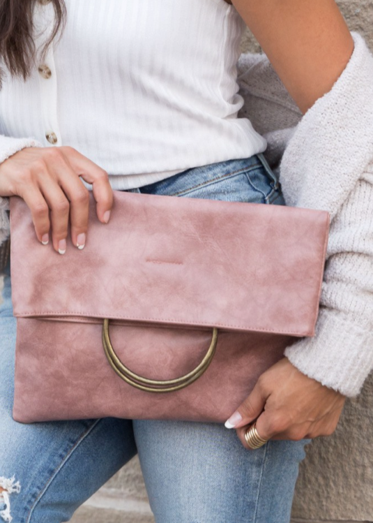 Baby pink 2025 suede clutch bag