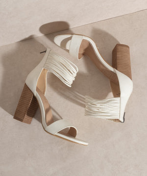 White heel with thick tan block heel