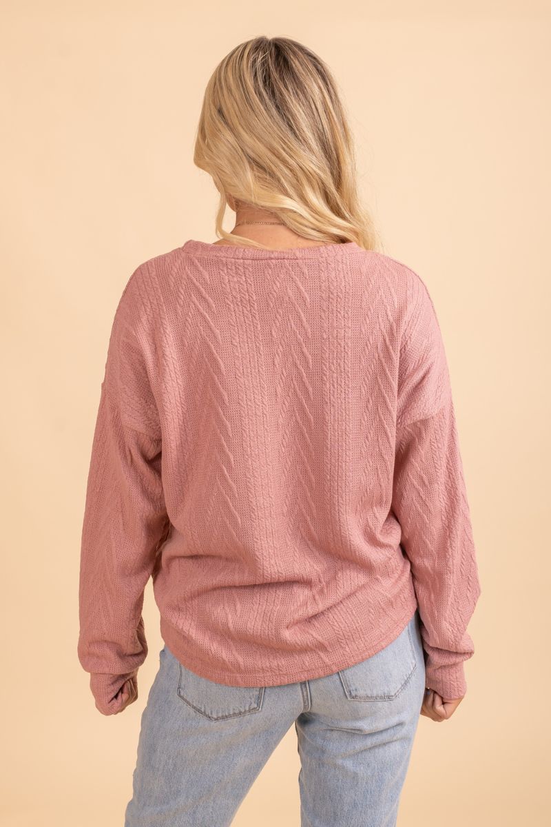 pink textured long sleeve pullover