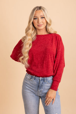 red long sleeve cinched waste long sleeve top