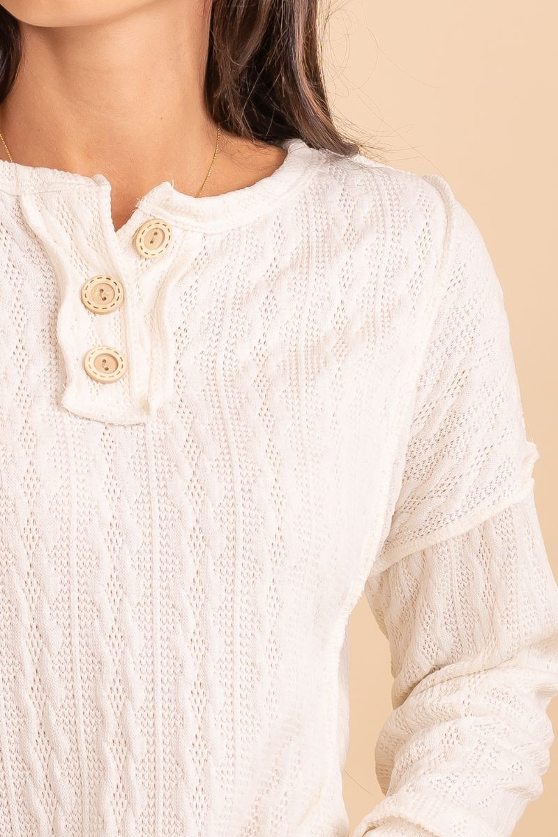 partly button up white cable knit sweater