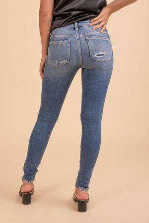 high wasted light wash distressed jeans 