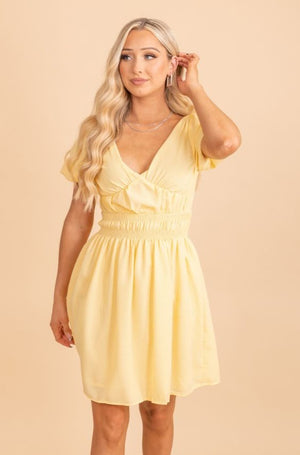 yellow v neck flowy mini dress
