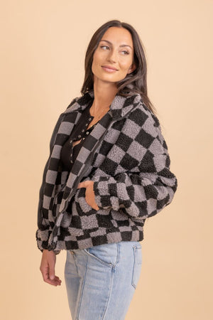 black and gray checkered zip up jacket