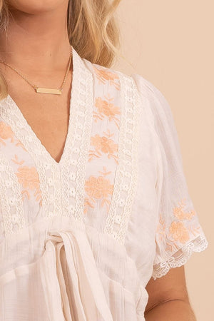 lace embroidered white and orange flowy mini dress 