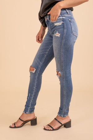 distressed open knee light wash womans jeans