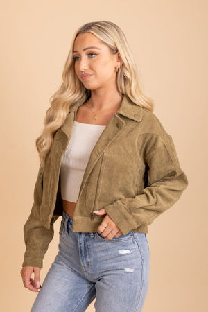 green corduroy material long sleeve jacket