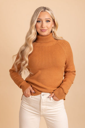 orange turtle neck knit sweater