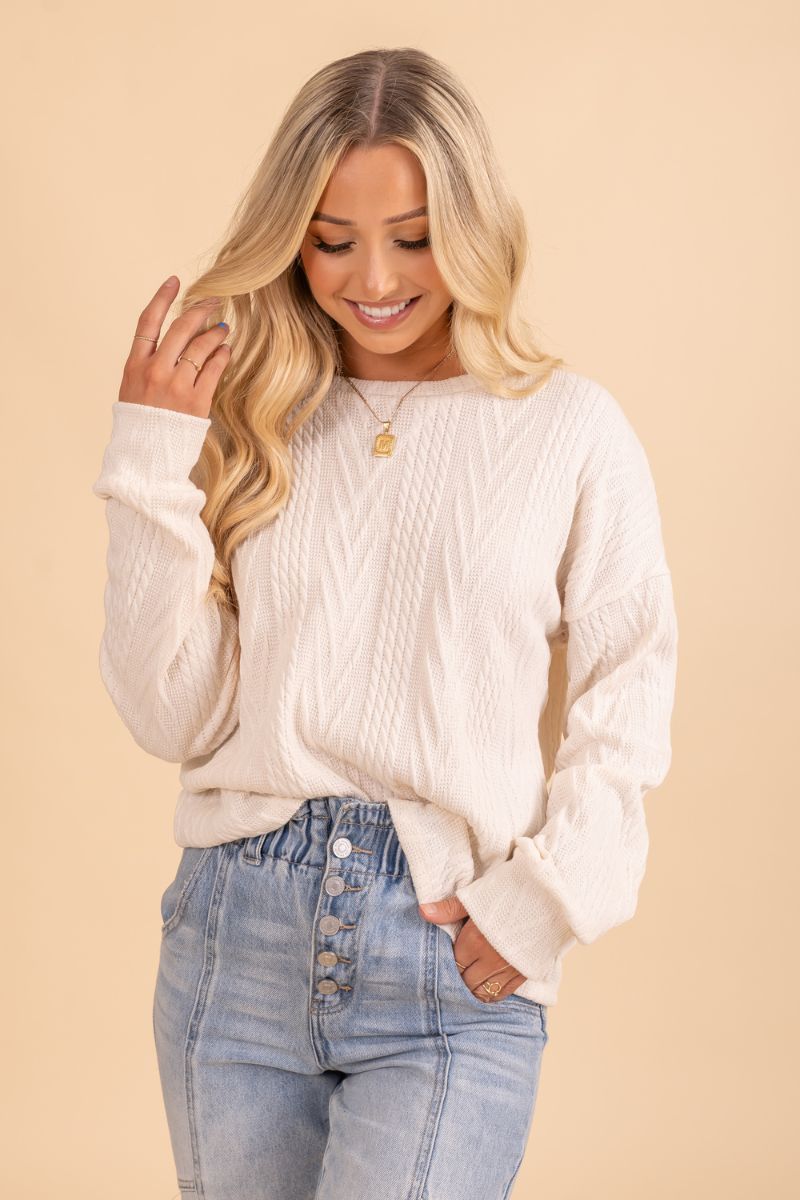 white long sleeve sweater