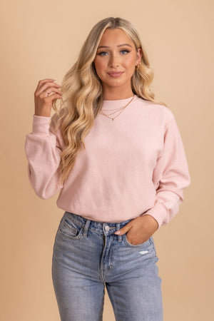 Pink long sleeve ribbed pullover top