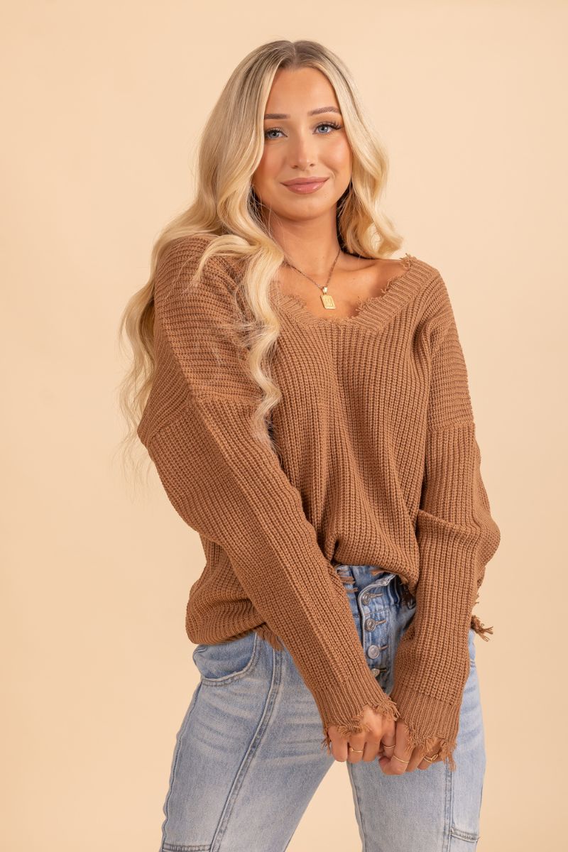 womans brown long sleeve distressed sweater