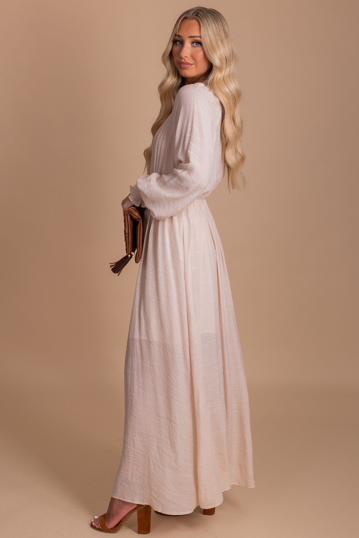 white flowy maxi dress with sleeves