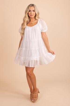 White tiered mini dress with puffy sleeves