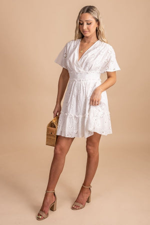White mini boutique dress with tiered bottom