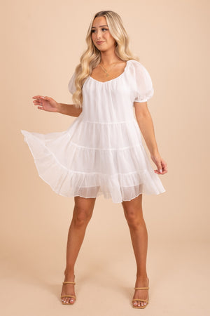White tiered mini dress with puffy sleeves