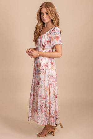 Maxi dress with floral print and light pink color