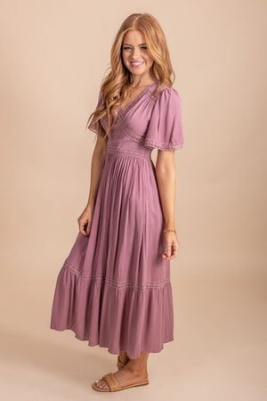Purple dress with ruffled tier and pleat accents