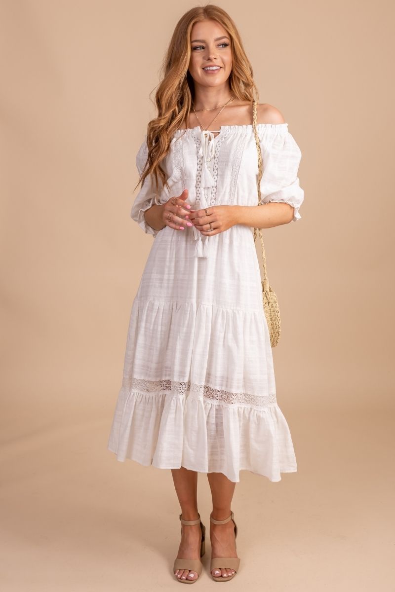 dress with puff sleeves and lace detail 
