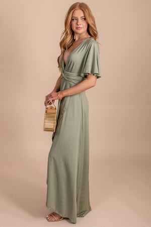 Women's green maxi dress with flutter sleeves and wrap