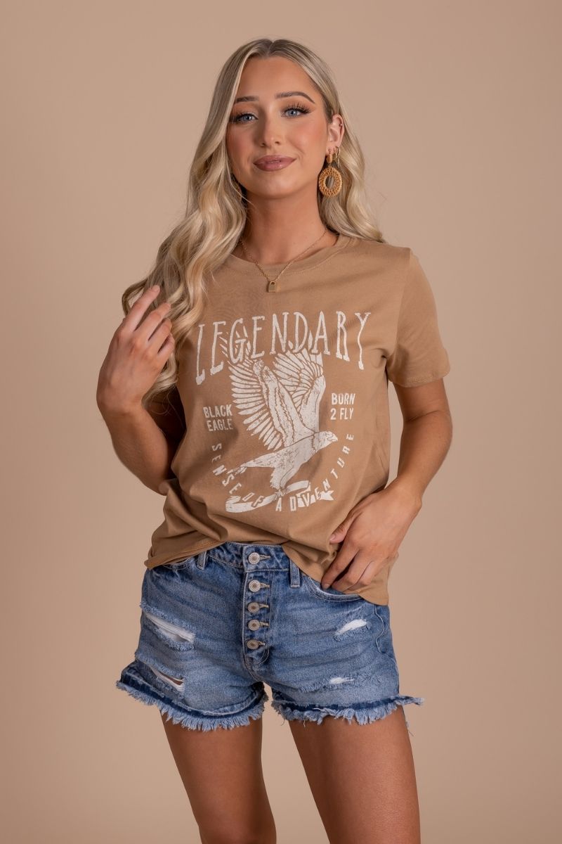 women's boutique graphic tee with "legendary" wording and bird graphic