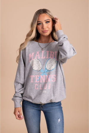 womens sweatshirt with "malibu tennis club" graphic