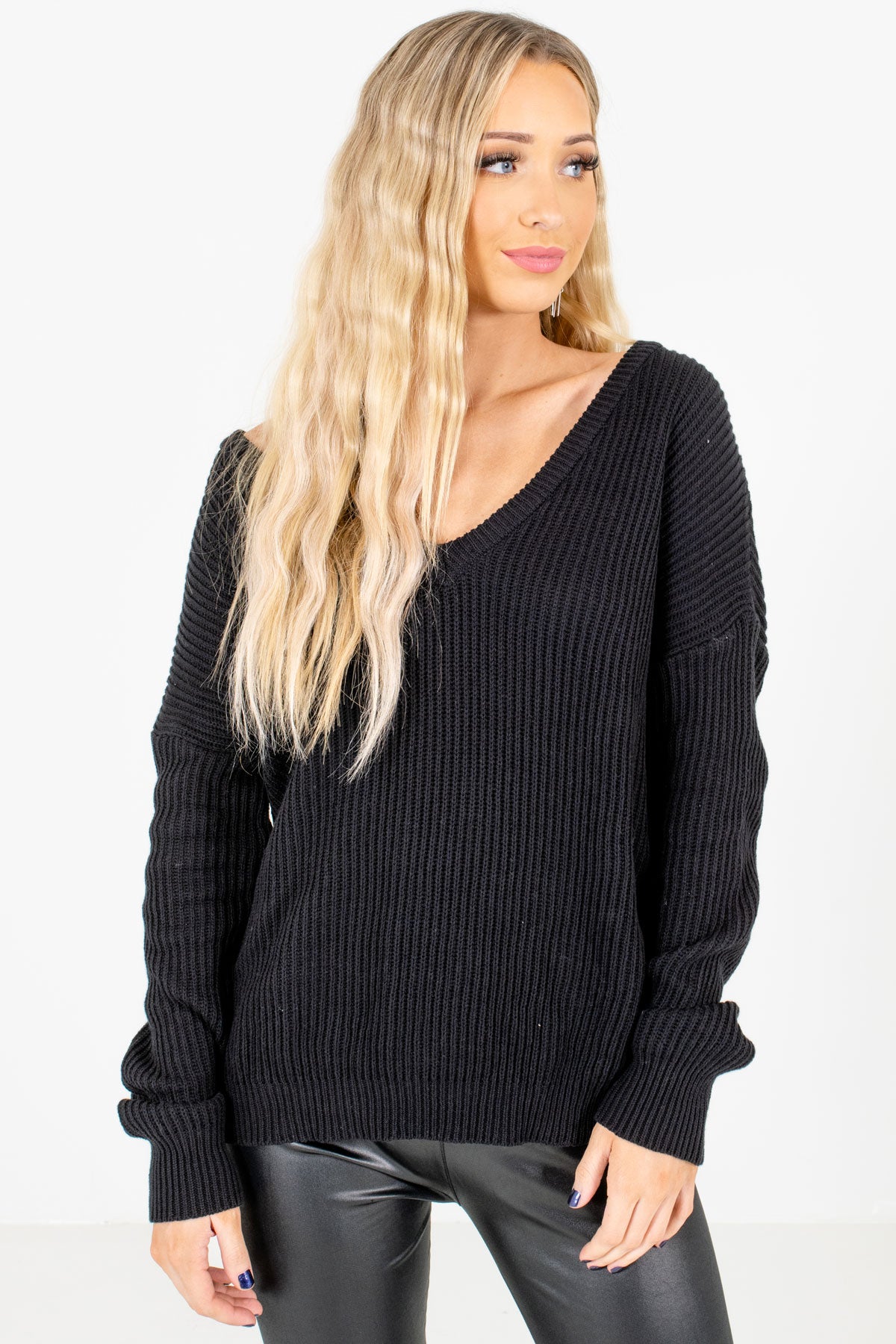 Back to Black! 🖤 You can shop our Fringy knit sweater dress in 2