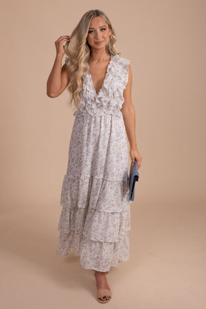 white ruffled maxi dress with floral details