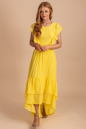 Bright yellow dress with high low hem 