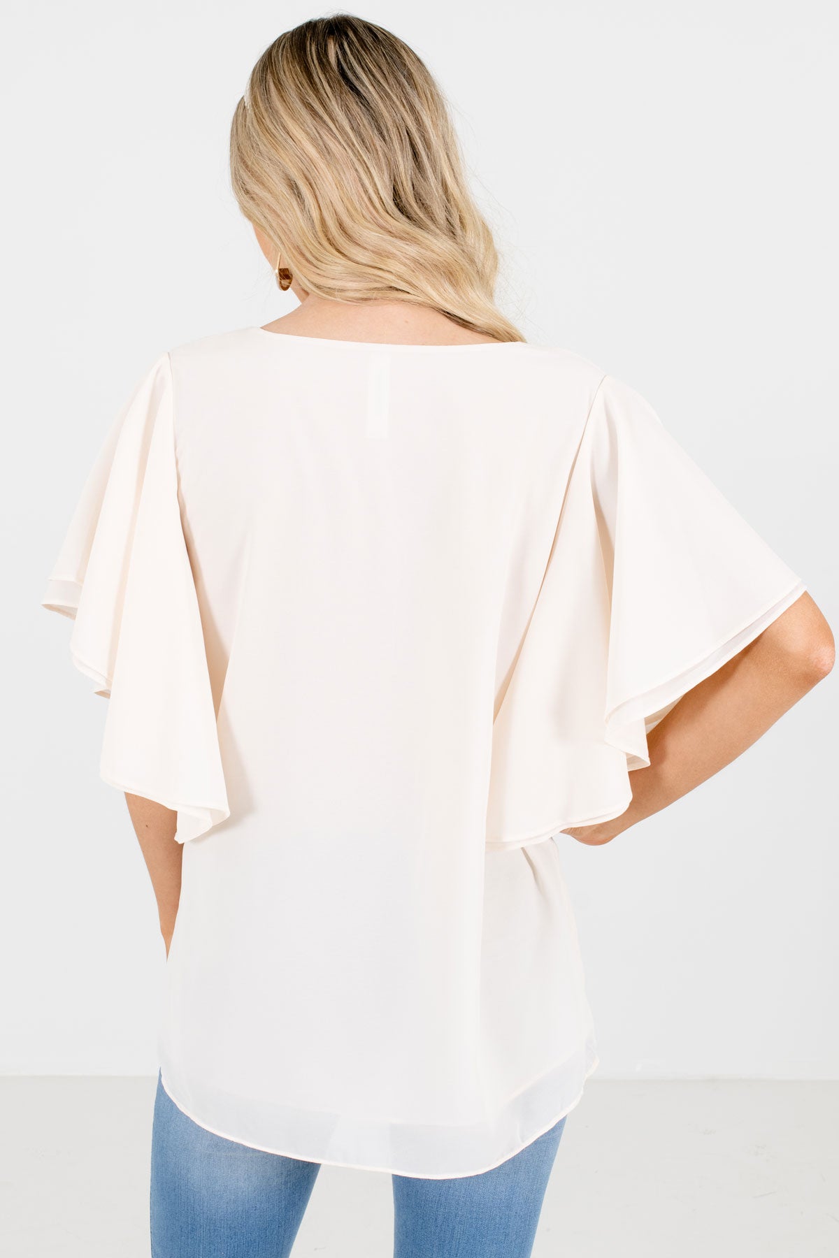 Take Care Flutter Sleeve Blouse | Bella Ella Boutique