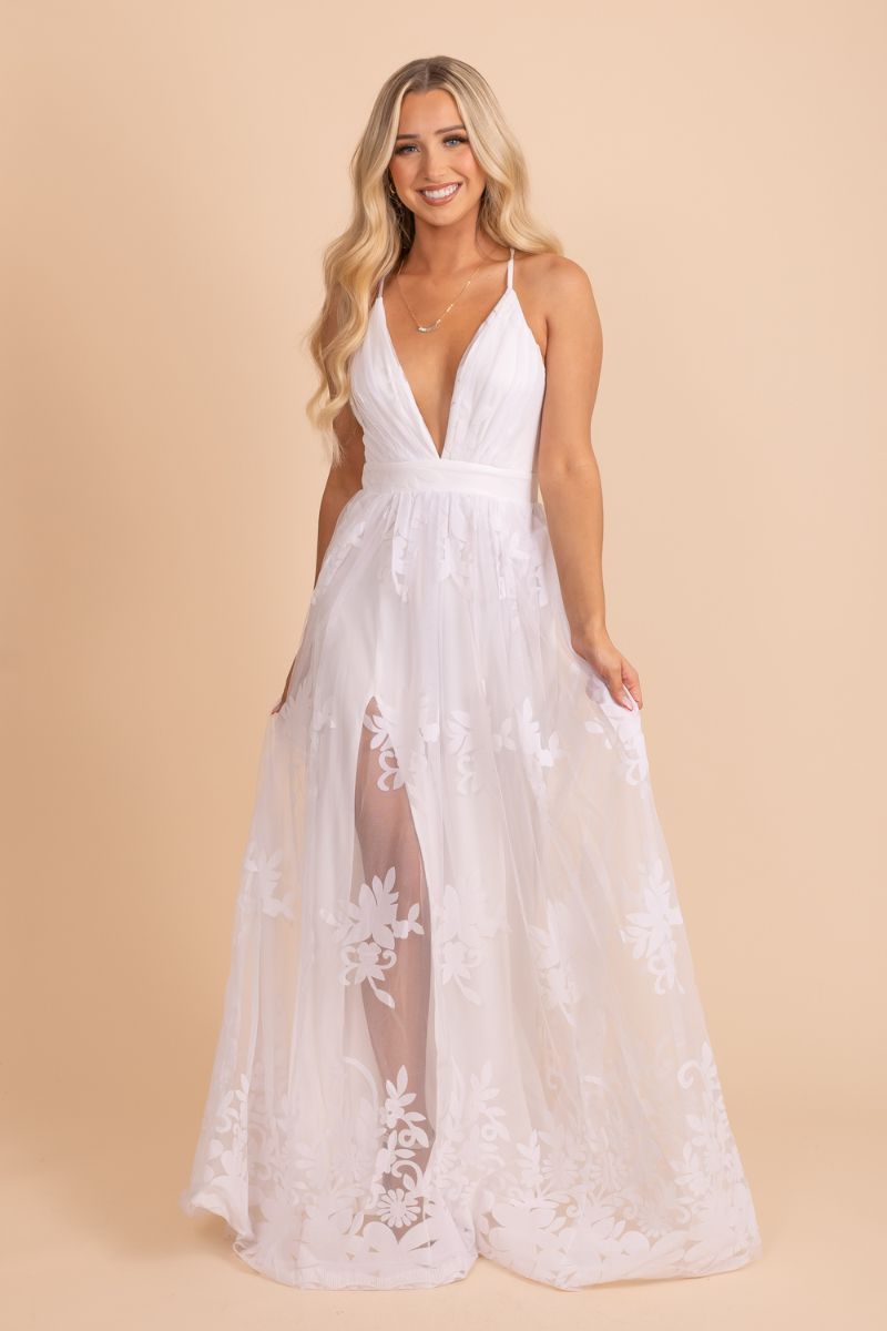 White floor length maxi dress with lace and deep v-neck
