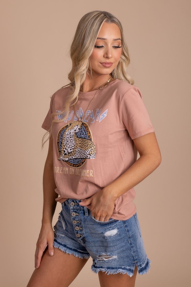 women's boho graphic tee with "wild dreams" lettering and leopard graphic
