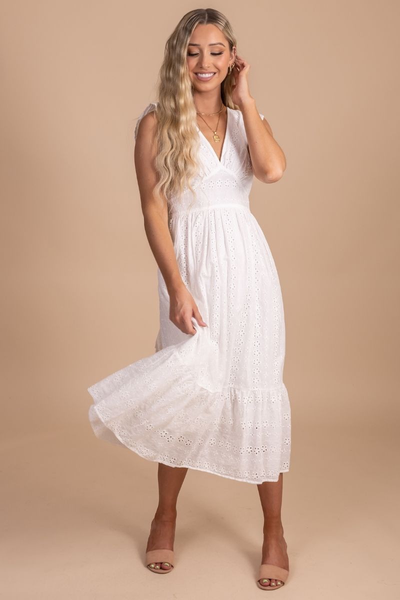 Boutique white dress with flutter sleeves