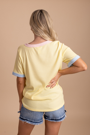 long yellow knit top