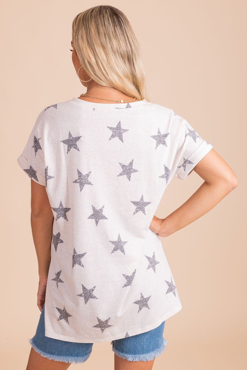 boutique star patterned tee with a split hem