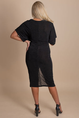 Boutique little black dress with form fitting style