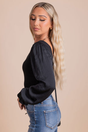 boutique women's long sleeve black bodysuit