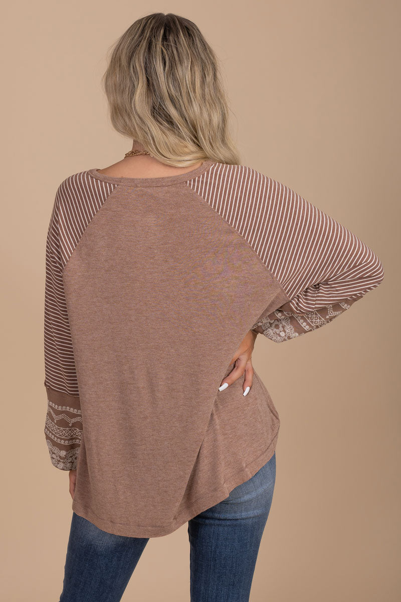 our favorite light brown striped sleeve top