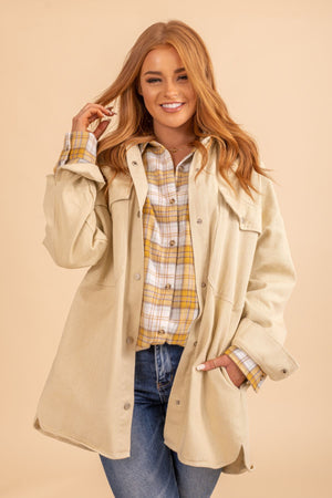 Cream colored button up front pocket jacket