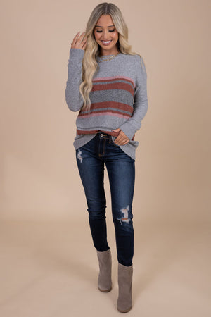 gray and pink sweater
