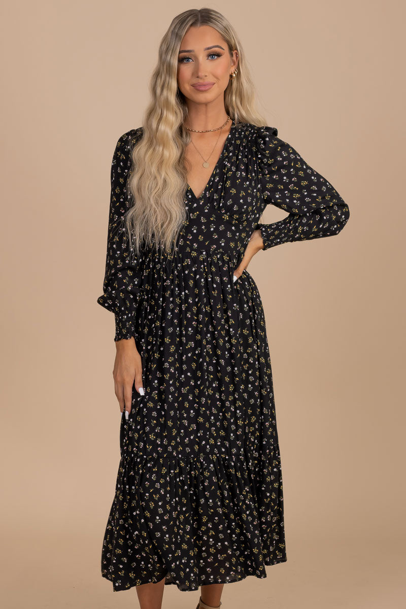 boutique black floral print midi dress with long sleeves