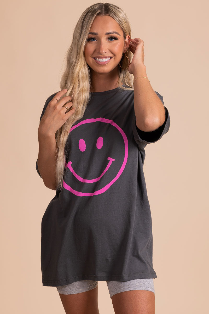 women's dark gray graphic tee with purple smiley face