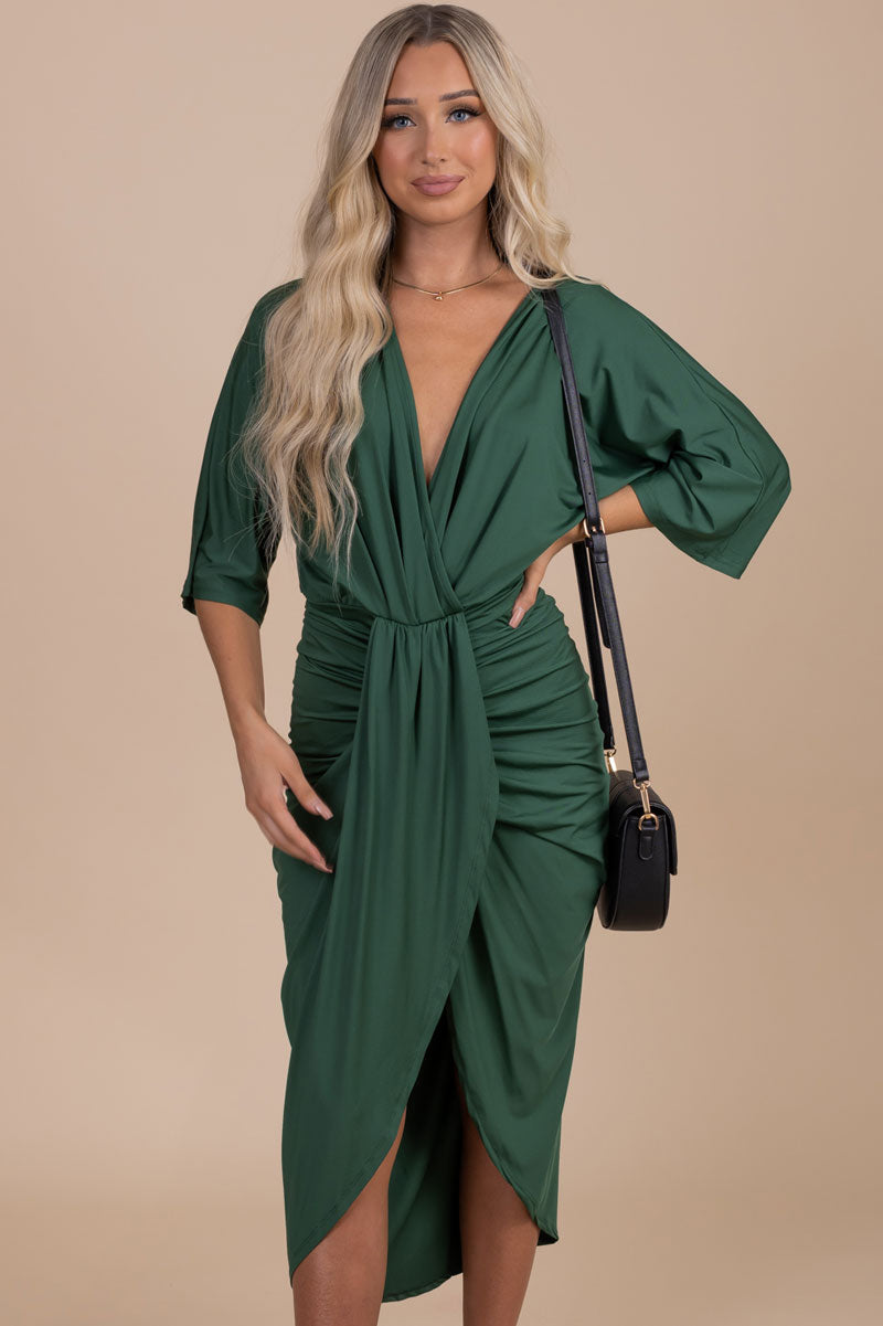 boutique dark hunter green midi dress with ruched twisted detail on front
