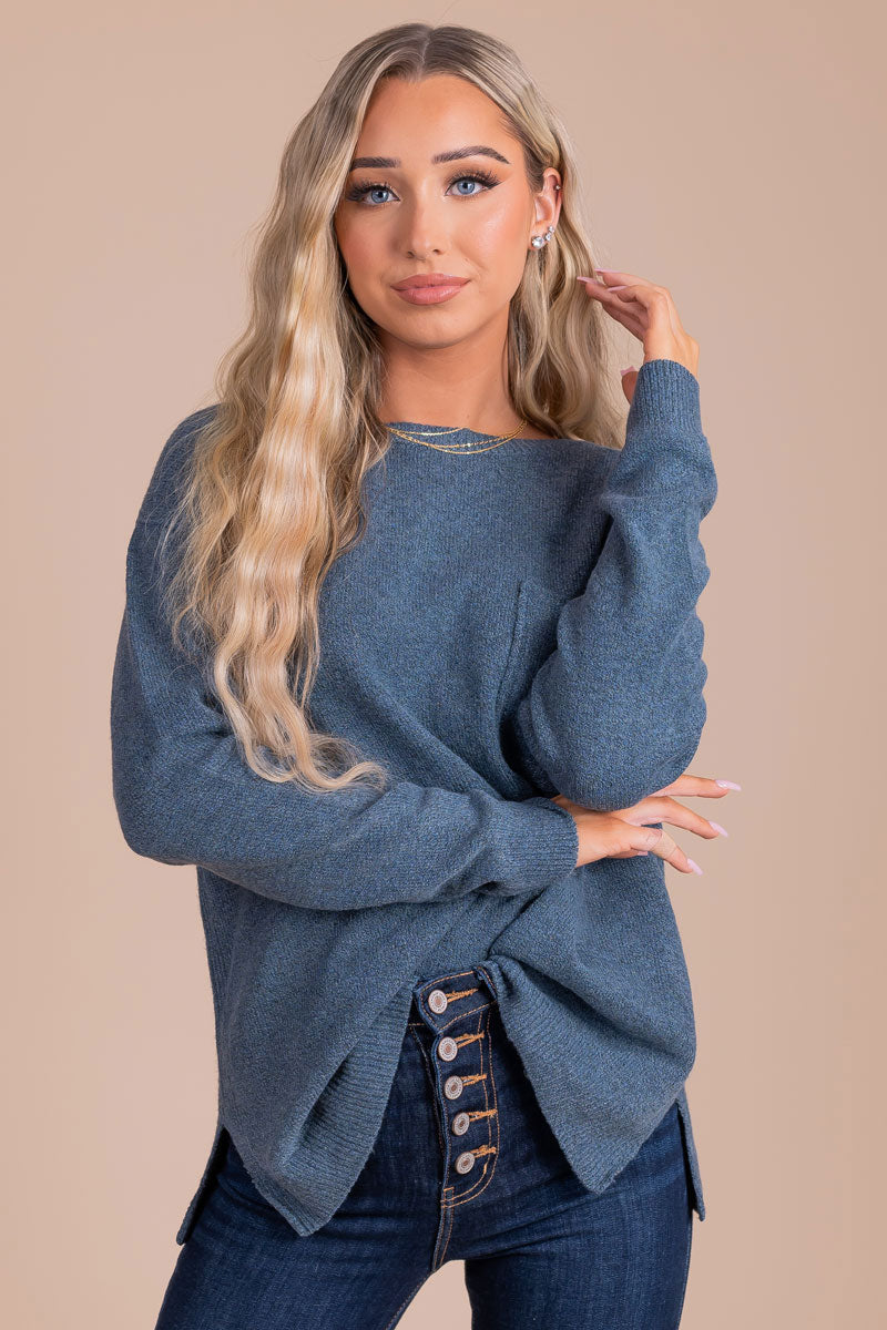 boutique women's dark blue long sleeve sweater with pocket details