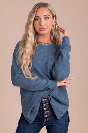 boutique women's dark blue long sleeve sweater with pocket details