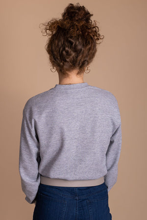 boutique light heather gray cropped long sleeve sweater