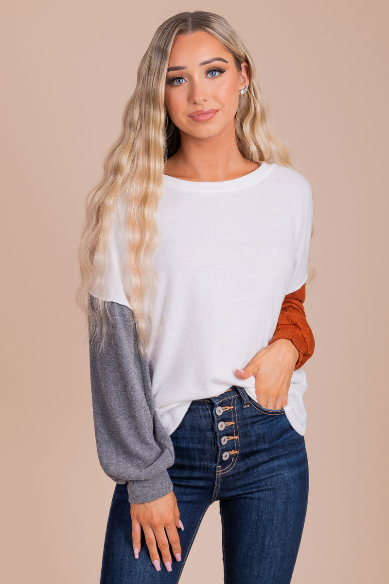 women's boutique white, gray, and orange color block top
