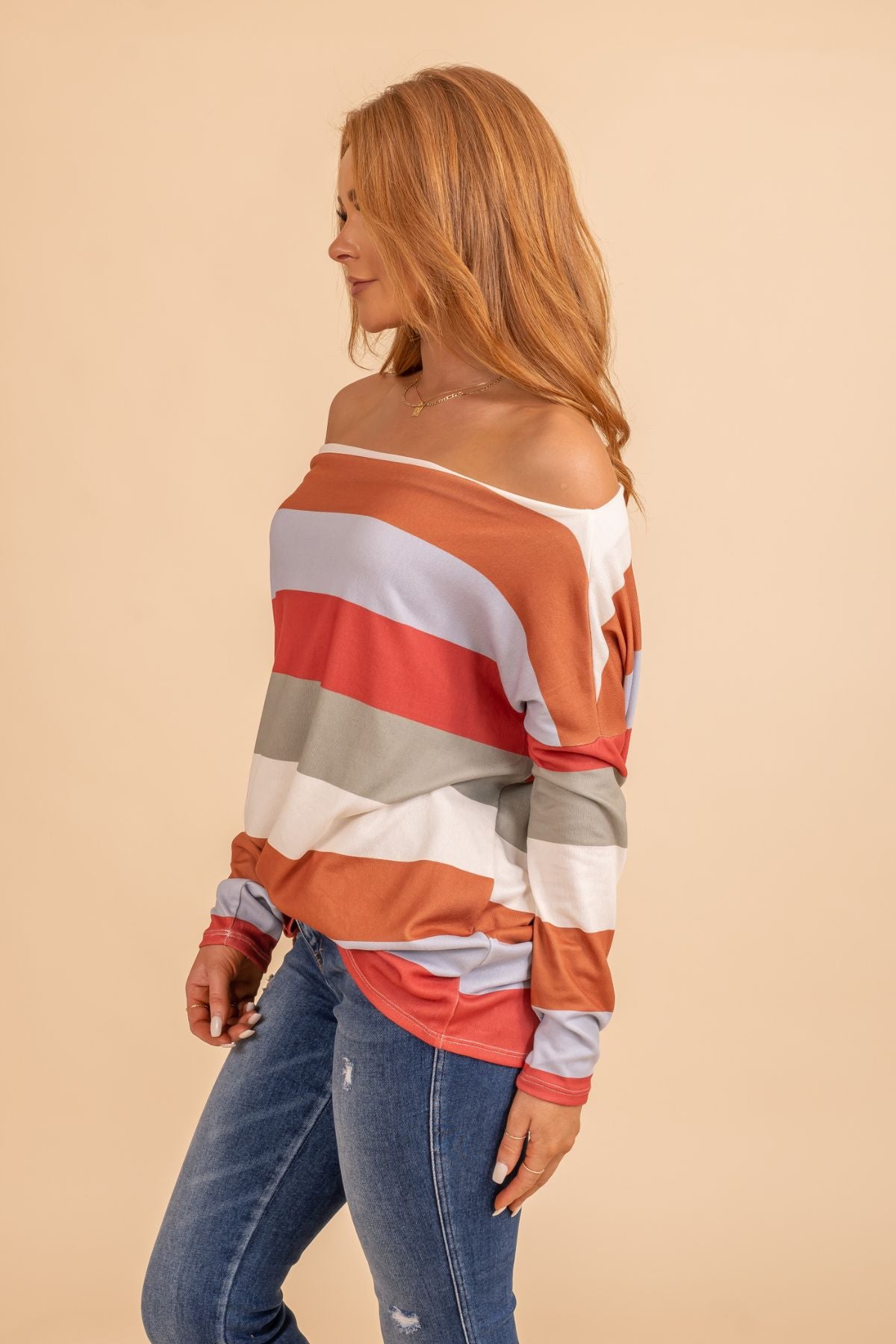 Oversized long sleeve off the shoulder striped top